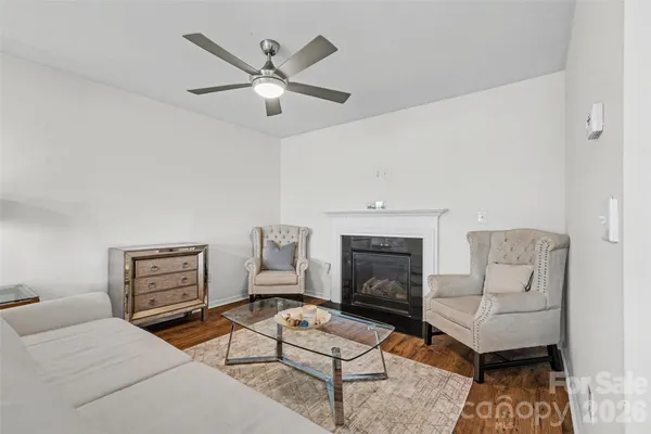 a bathroom with a double vanity sink toilet mirror and shower