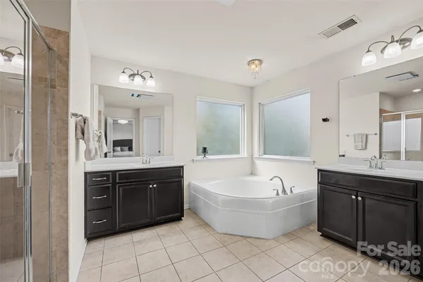 a living room with furniture a rug and a window