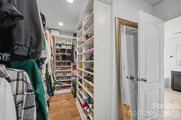 a bathroom with a toilet and shower