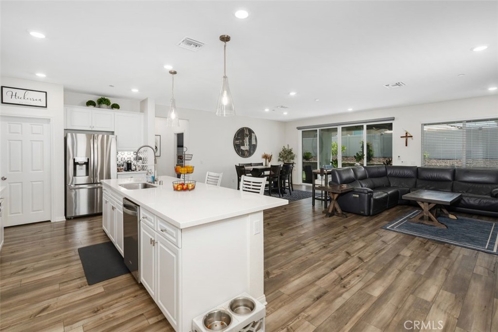 7598 Orangebrook Cove Riverside, CA 92507 - Photo 10 of 45 Open Concept Living Features a Blend of Living Spaces