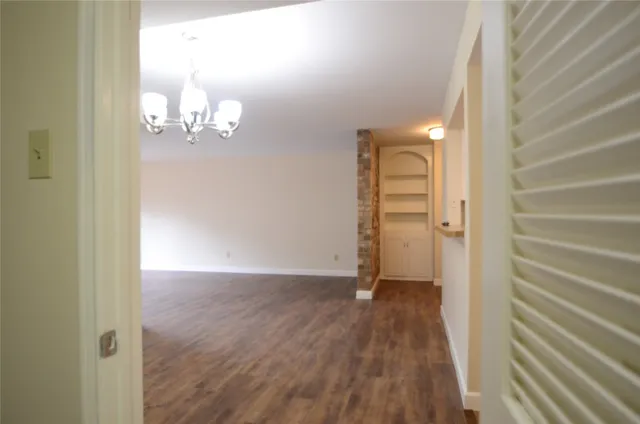 a view of a bathroom from a hallway