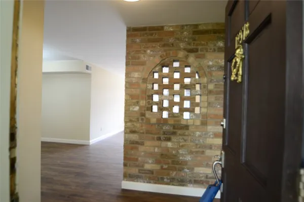 a bathroom with a glass door