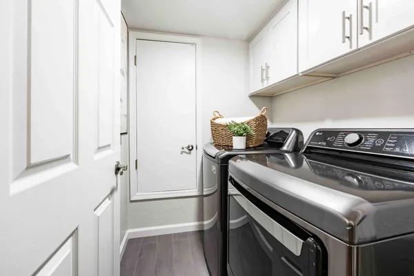 a kitchen with a stove and a refrigerator