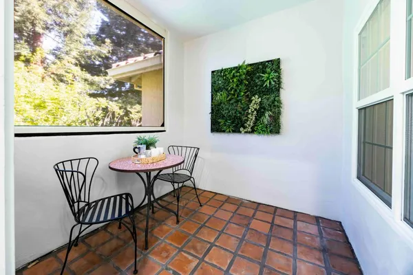 a outdoor dining space with furniture