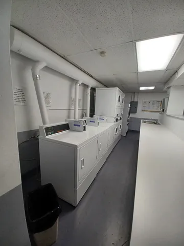 a utility room with washer and dryer
