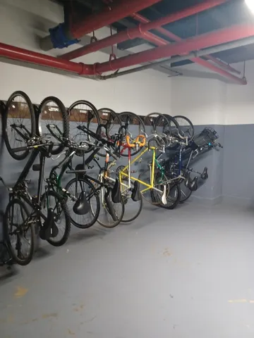 a view of a garage with parked cars