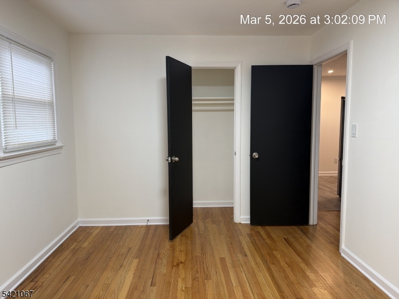 900 Smith Street, Unit 2 Linden, NJ 07036 - Photo 8 of 9 wooden floor in an empty room