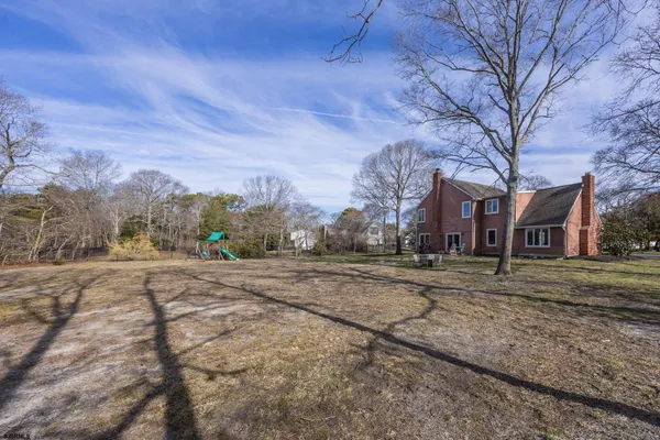 a bed room with a bed chair and a window
