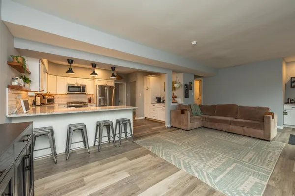 a room with toys and dresser