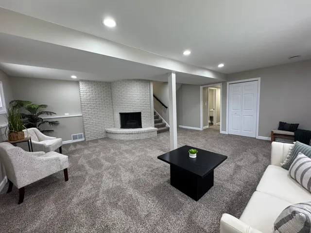 a living room with furniture and a couch