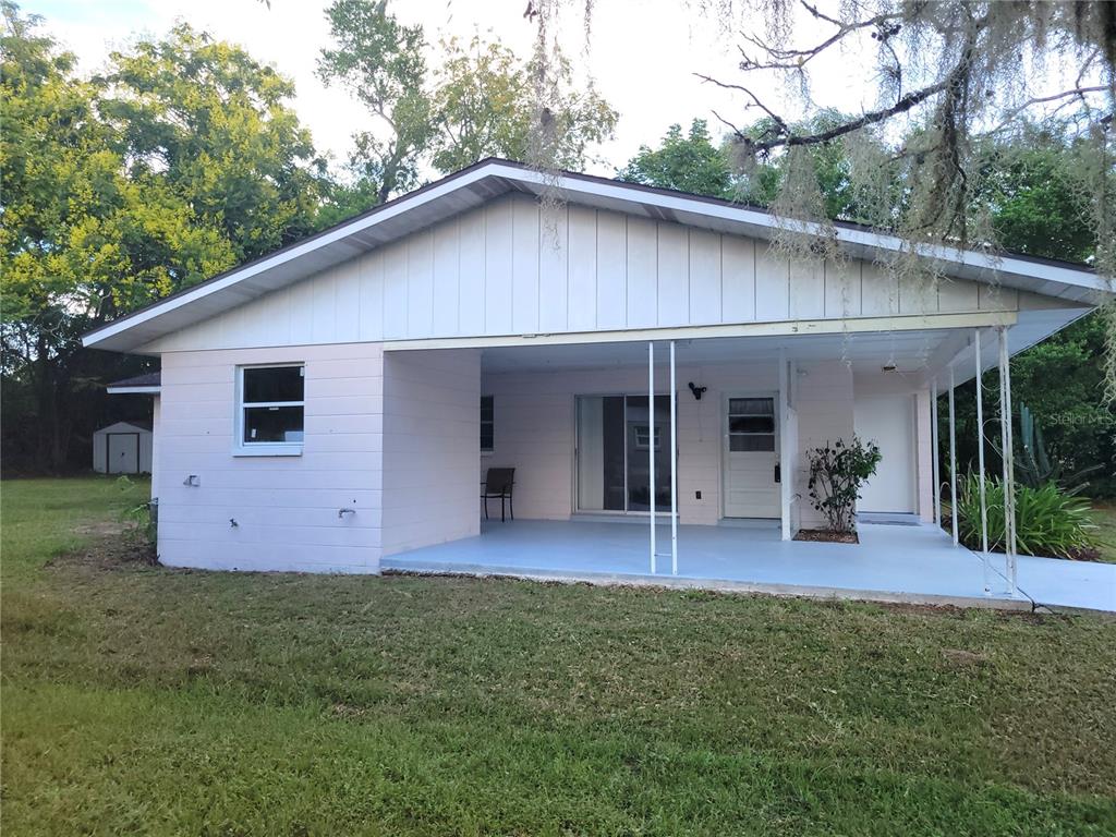 516 B Track Run Ocala, FL 34472 - Photo 29 of 41 a front view of house with yard and outdoor seating