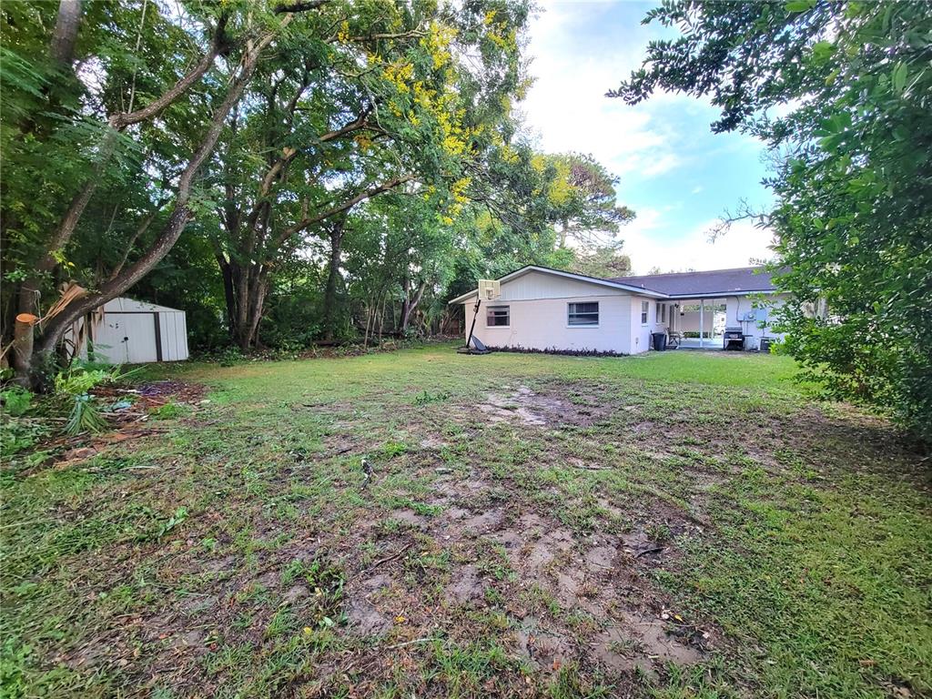 516 B Track Run Ocala, FL 34472 - Photo 32 of 41 a house view with a garden space