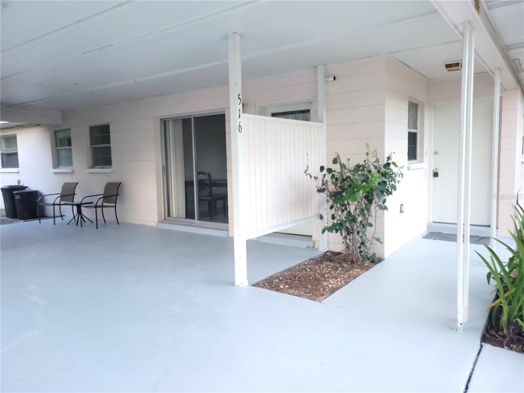 516 B Track Run Ocala, FL 34472 - Photo 6 of 41 a view of a hallway with furniture and a table