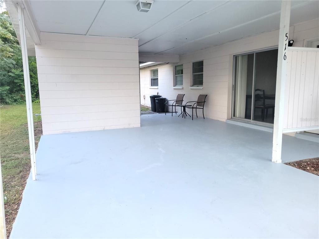 516 B Track Run Ocala, FL 34472 - Photo 7 of 41 a view of livingroom with furniture and staircase