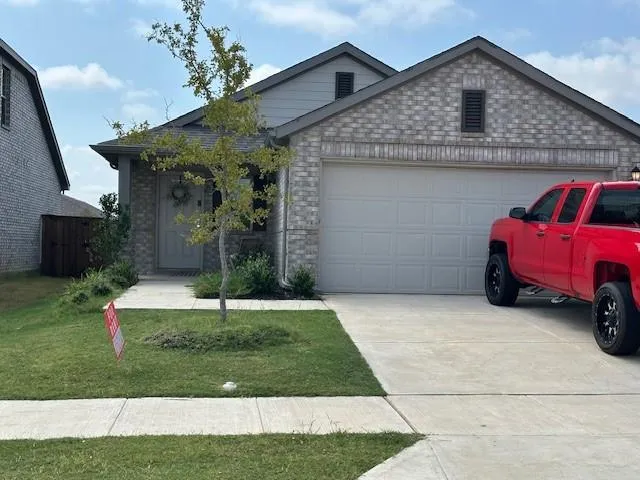 a house view with a garden space