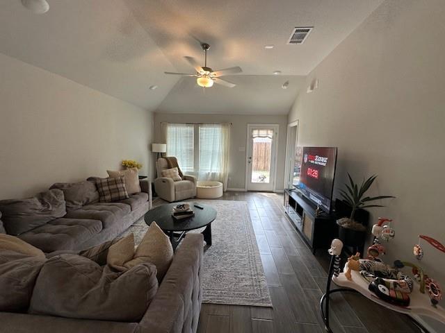 14032 Earlham Street Pilot Point, TX 76258 - Photo 11 of 32 a living room with furniture and a flat screen tv