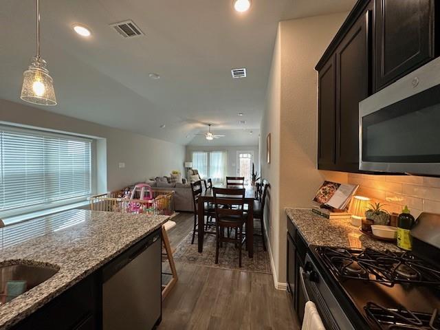 14032 Earlham Street Pilot Point, TX 76258 - Photo 7 of 32 a kitchen with lots of counter top space
