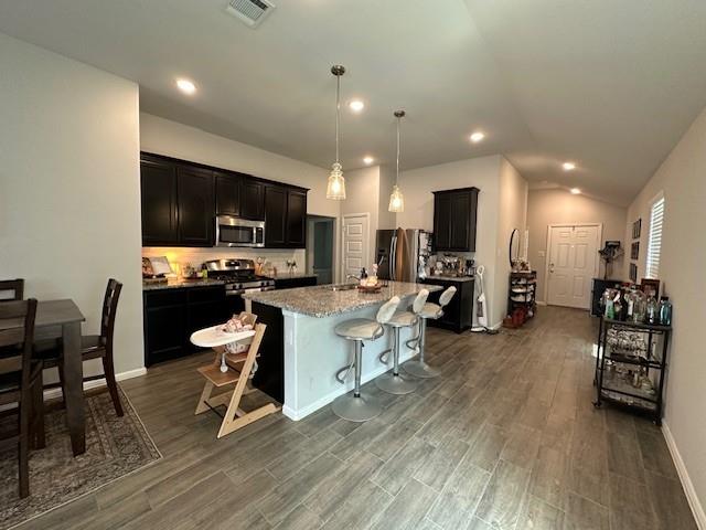 14032 Earlham Street Pilot Point, TX 76258 - Photo 10 of 32 a large kitchen with a table and chairs