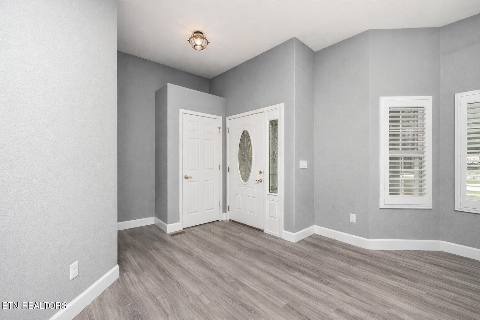 260 Rotherham Drive Crossville, TN 38558 - Photo 6 of 55 Modern entryway with white doors and shu