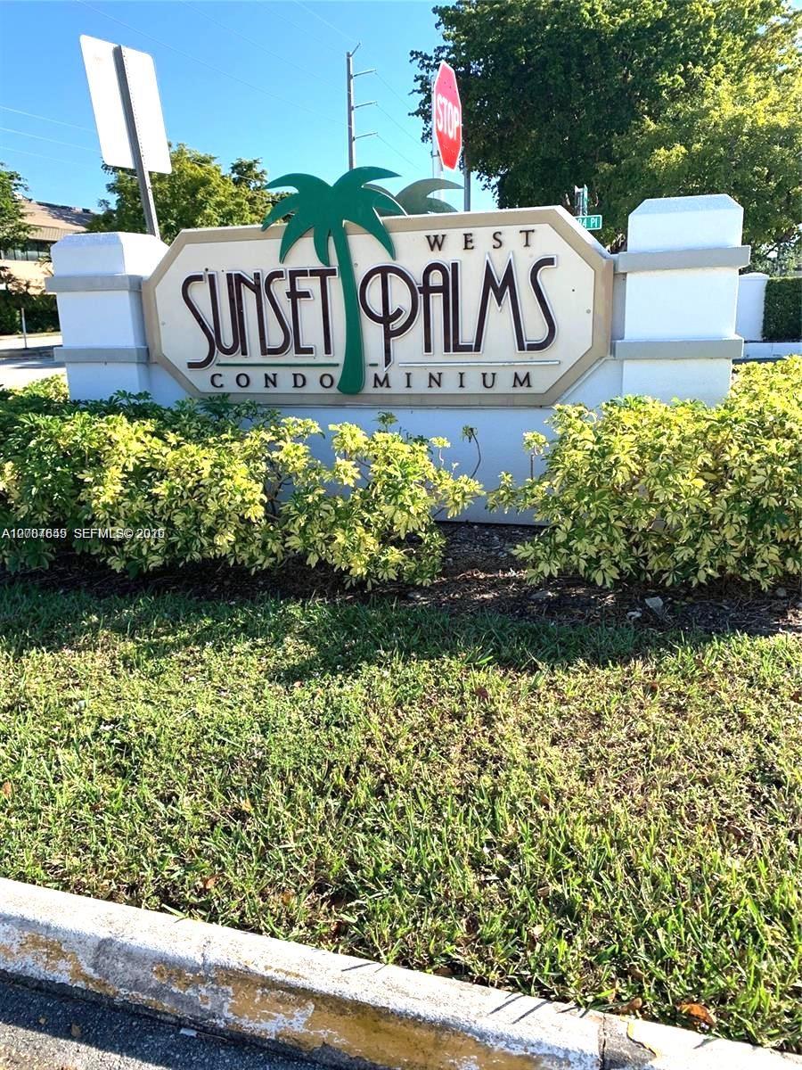 7256 Southwest 94th Place, Unit A4 Miami, FL 33173 - Photo 1 of 18 a sign on the side of a building