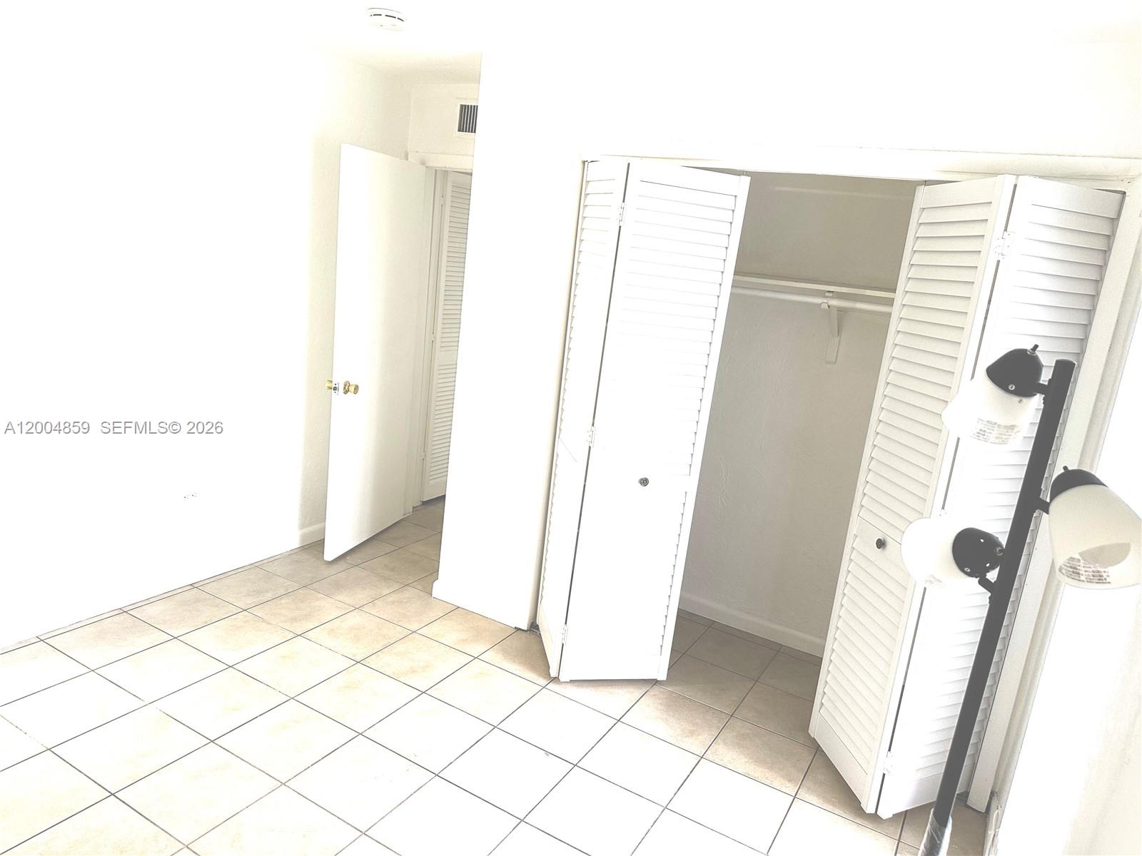 7256 Southwest 94th Place, Unit A4 Miami, FL 33173 - Photo 11 of 18 a view of a bathroom with a sink