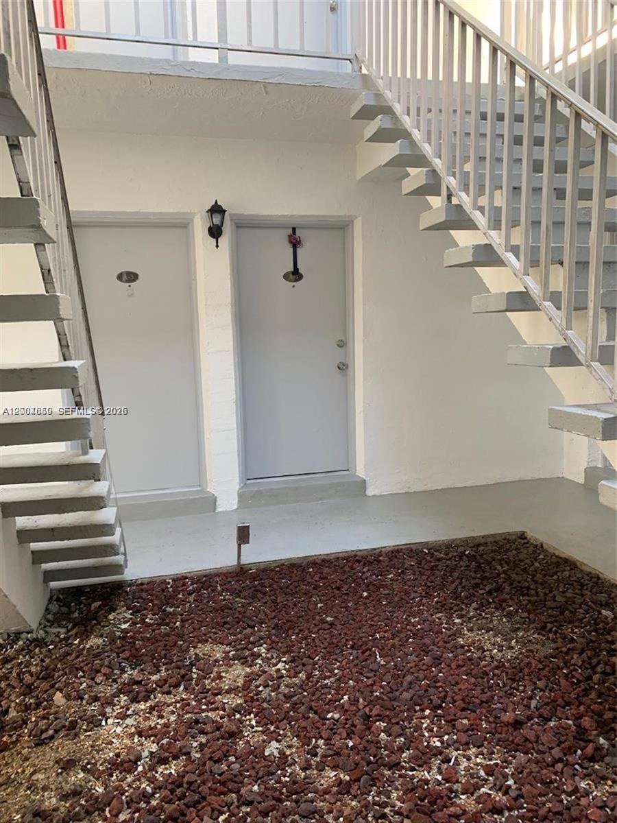 7256 Southwest 94th Place, Unit A4 Miami, FL 33173 - Photo 4 of 18 a view of entryway