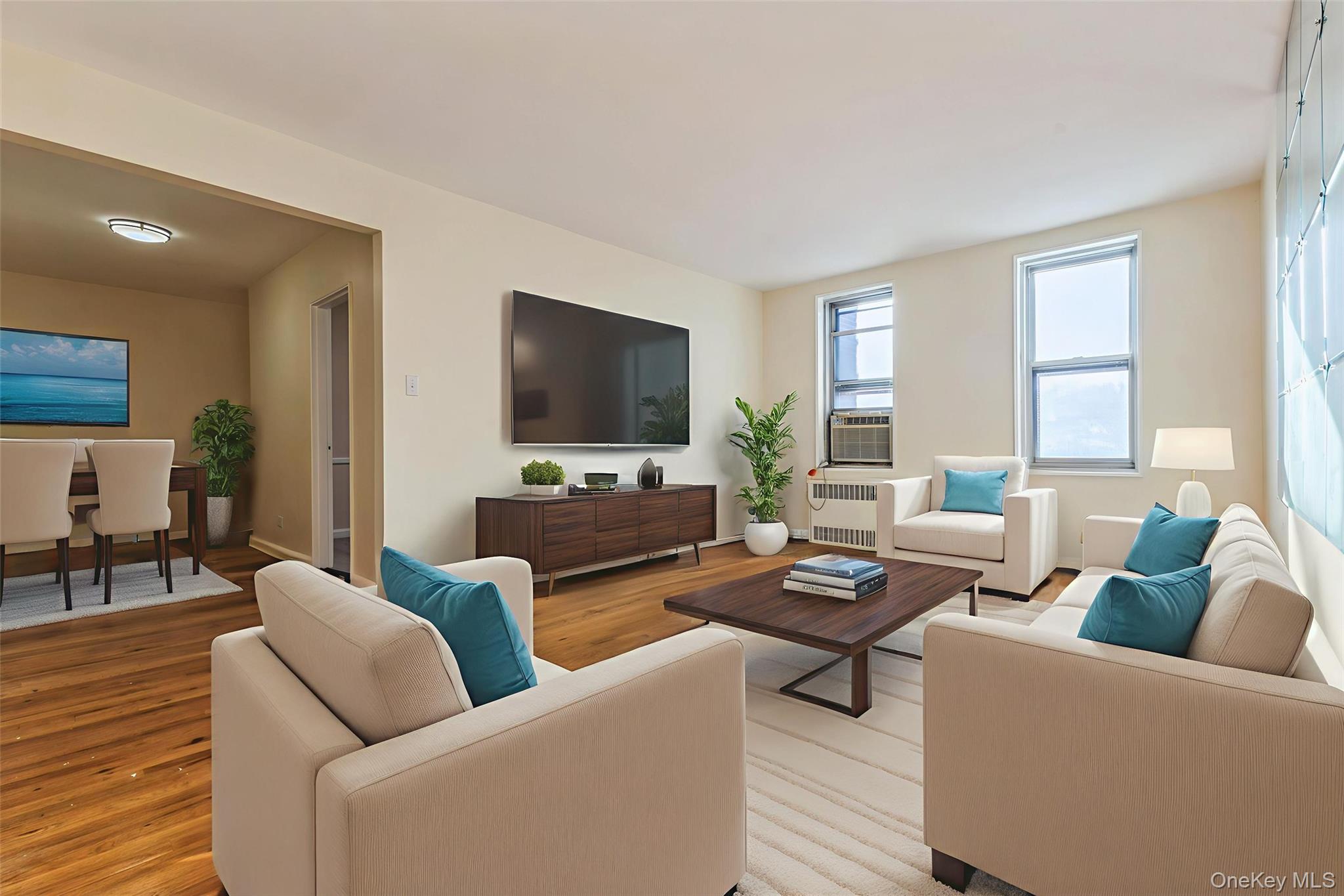 2232 Brigham Street, Unit EE4 Brooklyn, NY 11229 - Photo 1 of 16 Living area with radiator and wood finished floors