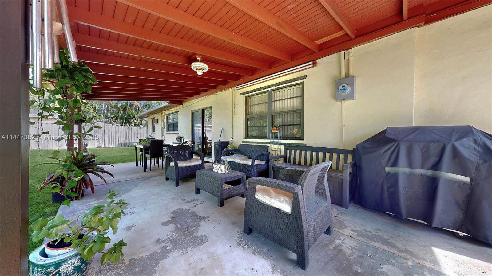 9815 Southwest 77th Street Miami, FL 33173 - Photo 24 of 30 a outdoor space with patio lots of furniture and plants