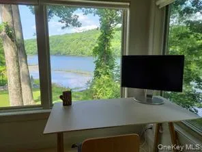a view of a tables and chairs in patio