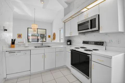 $240,000 | 10279 North Circle Lake Drive, Unit 202, Boynton Beach, FL 33437