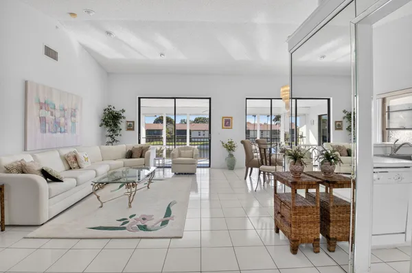 a living room with furniture and a table