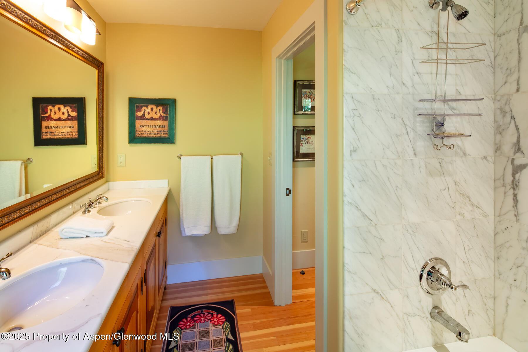 2147 Lower River Road Snowmass, CO 81654 - Photo 27 of 61 a bathroom with a sink and a shower