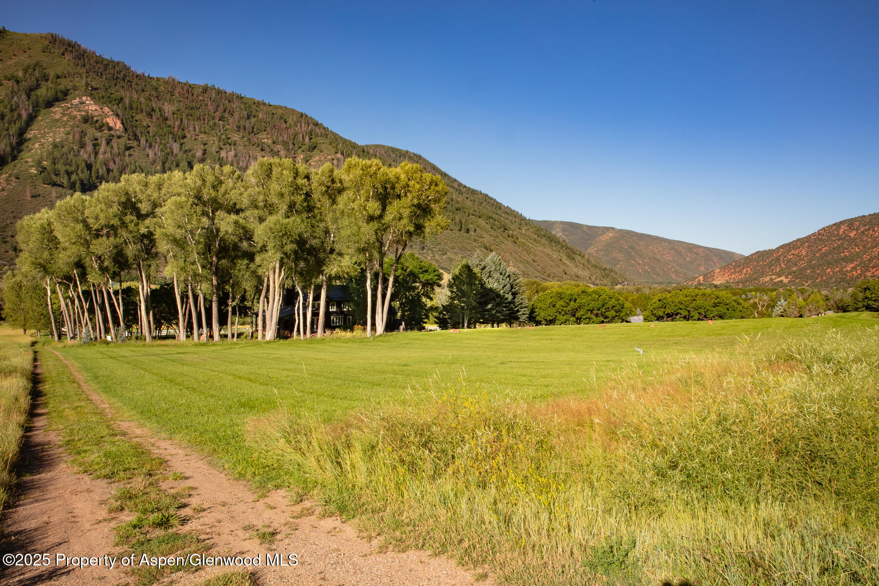 2147 Lower River Road Snowmass, CO 81654 - Photo 51 of 61 a view of an ocean with a mountain