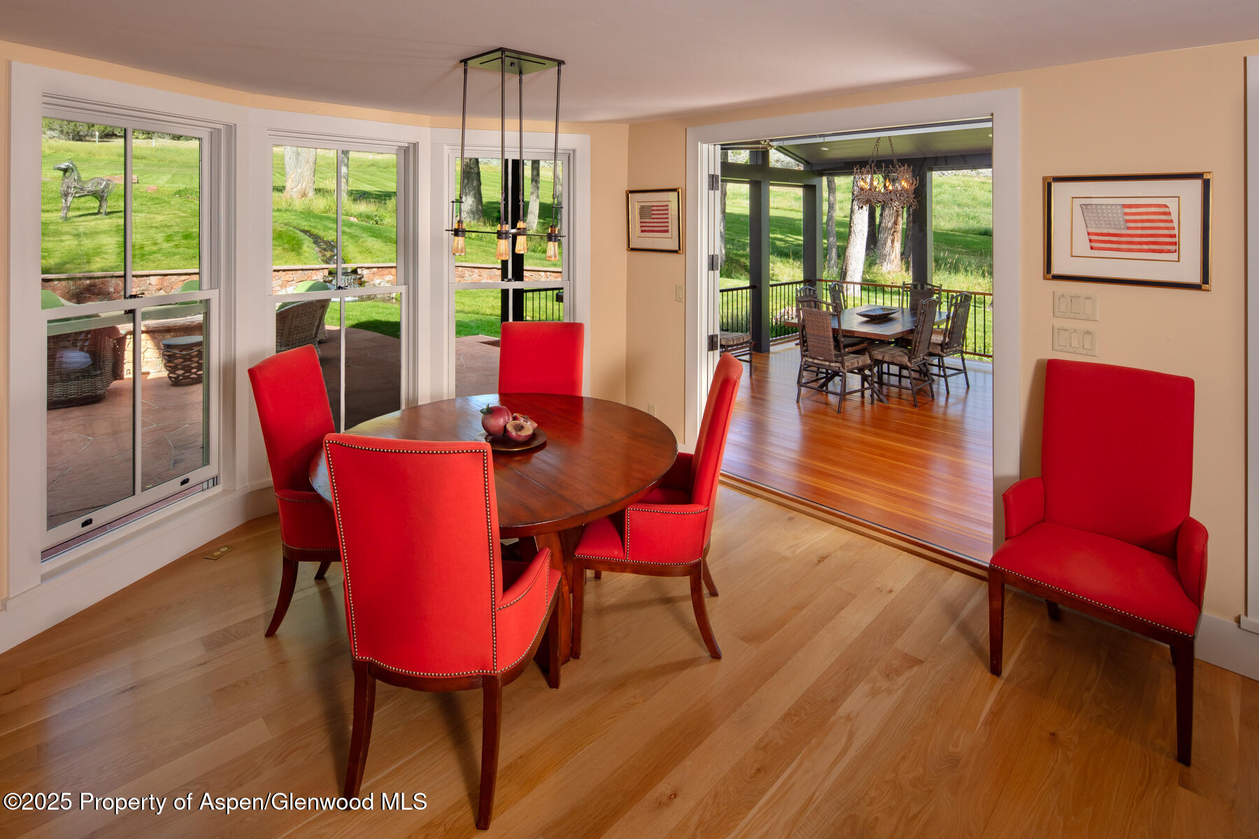 2147 Lower River Road Snowmass, CO 81654 - Photo 10 of 61 a view of a dining room with furniture window and wooden floor
