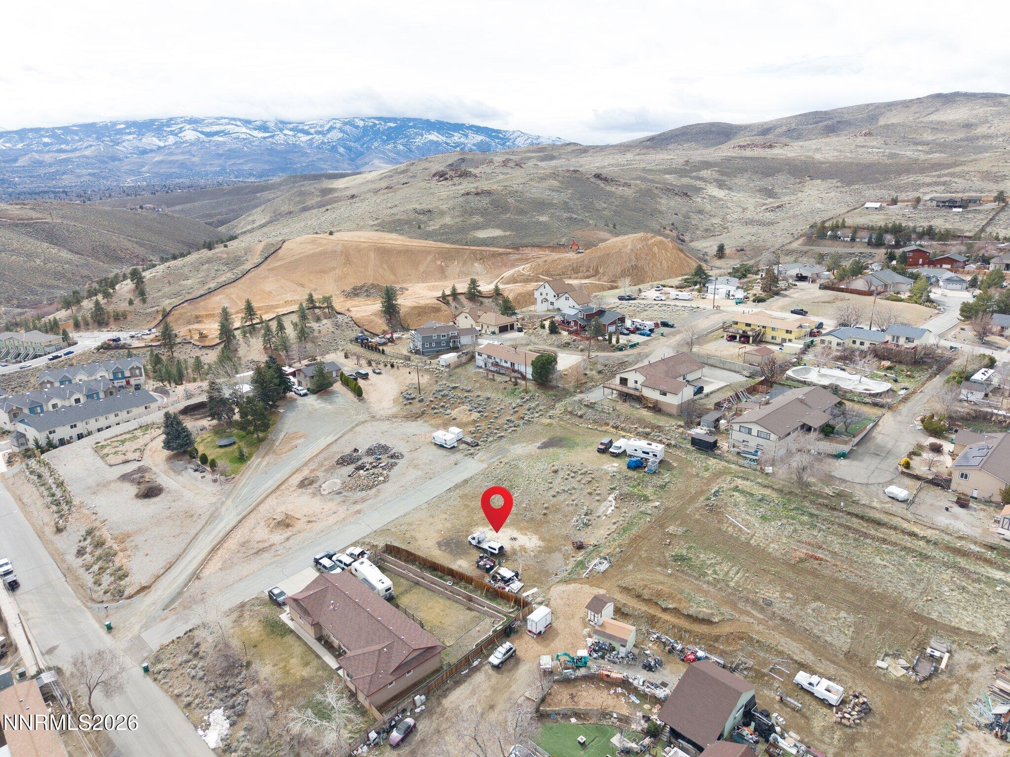 an aerial view of houses with outdoor space