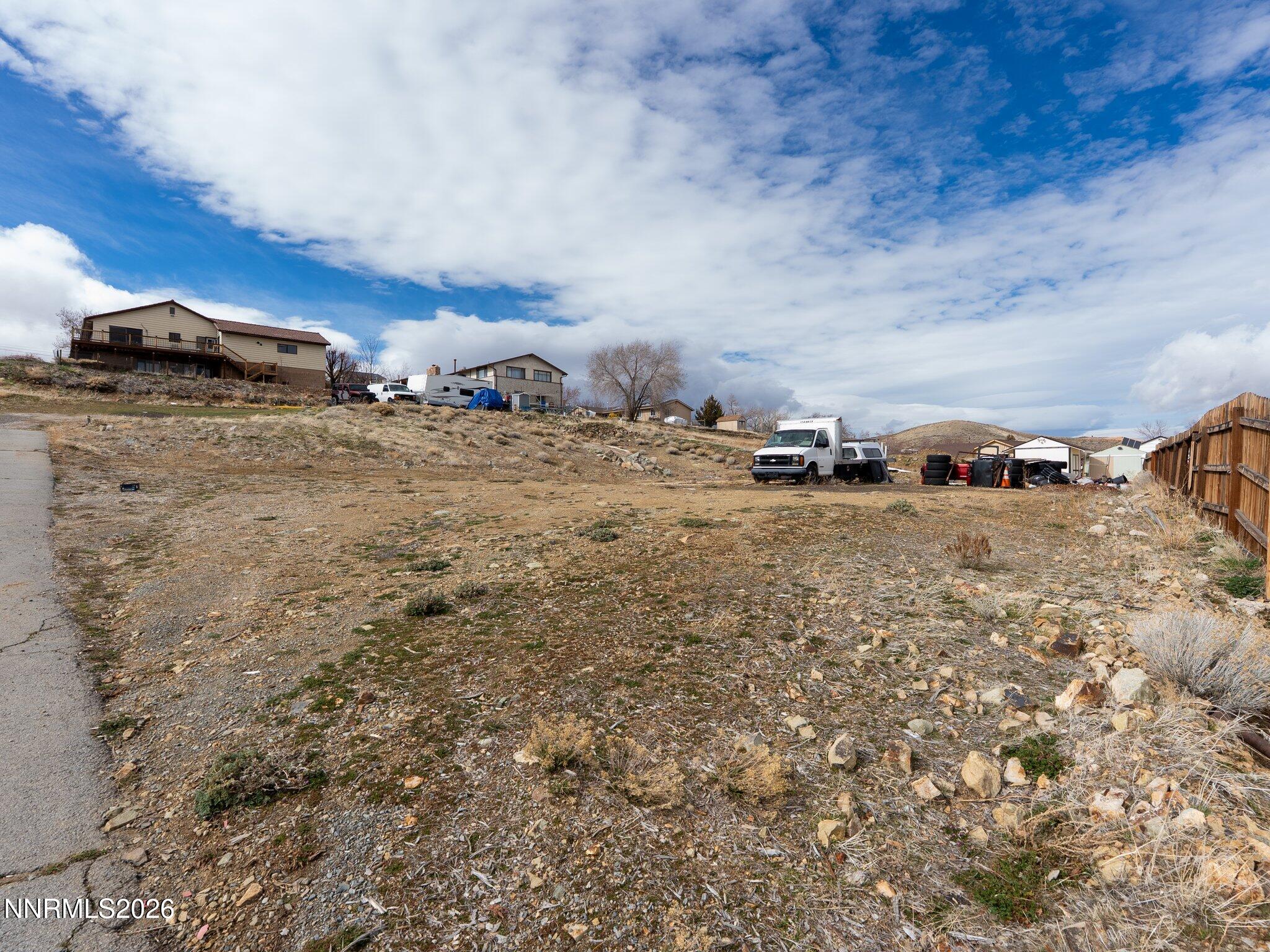 0 Stoltz Road Reno, NV 89506 - Photo 5 of 15 a view of a dry yard with wooden fence