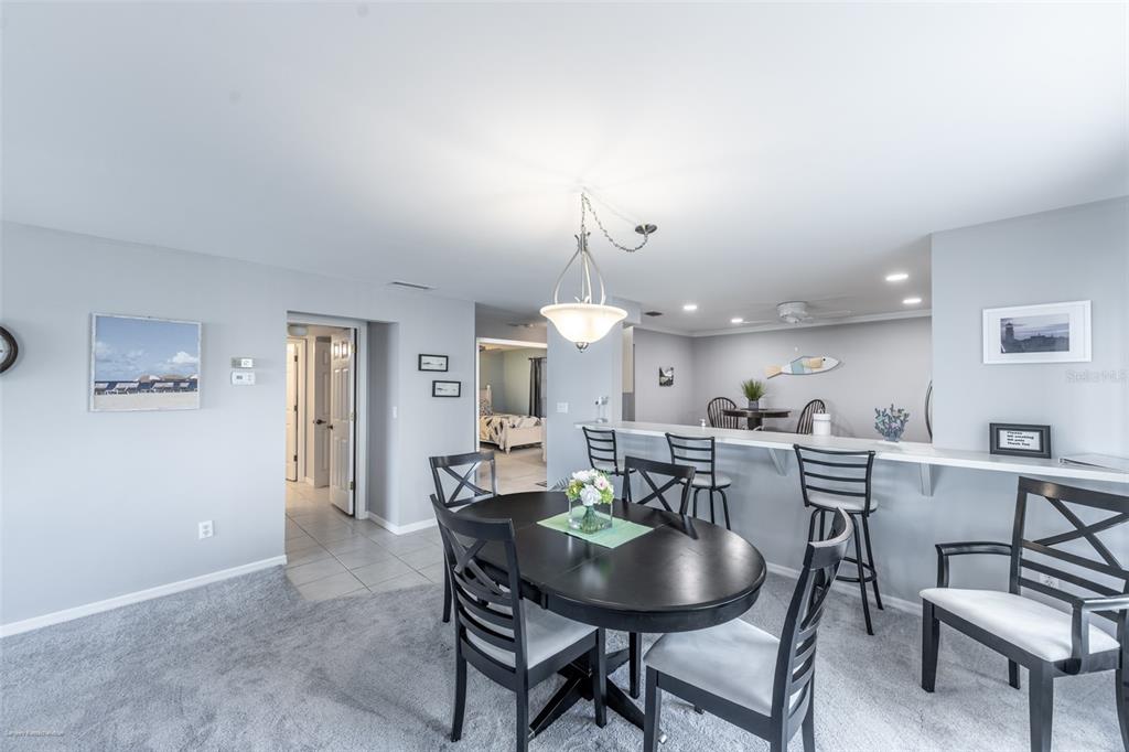 1477 Park Beach Circle, Unit 11 Punta Gorda, FL 33950 - Photo 19 of 49 a view of a dining room with furniture