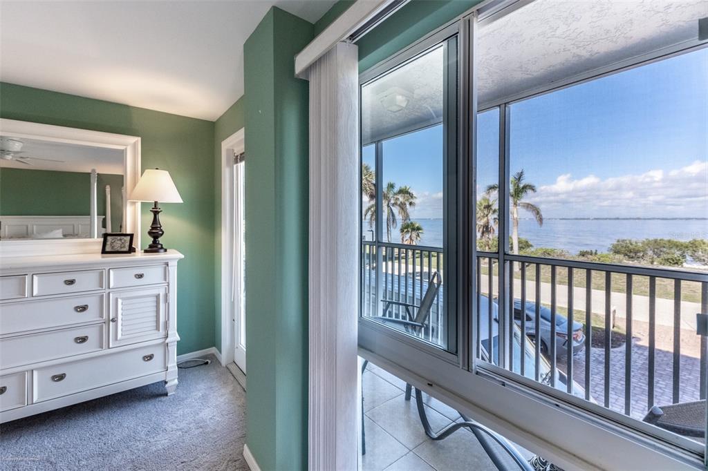 1477 Park Beach Circle, Unit 11 Punta Gorda, FL 33950 - Photo 37 of 49 a view of a hallway to a livingroom with furniture