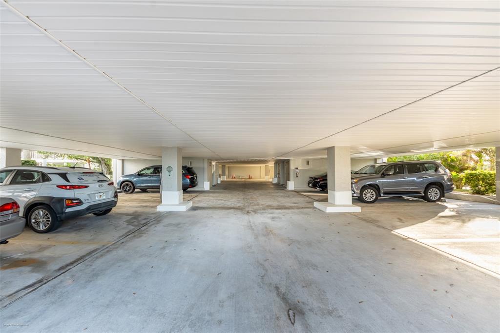 1477 Park Beach Circle, Unit 11 Punta Gorda, FL 33950 - Photo 45 of 49 a view of parking area and car parked