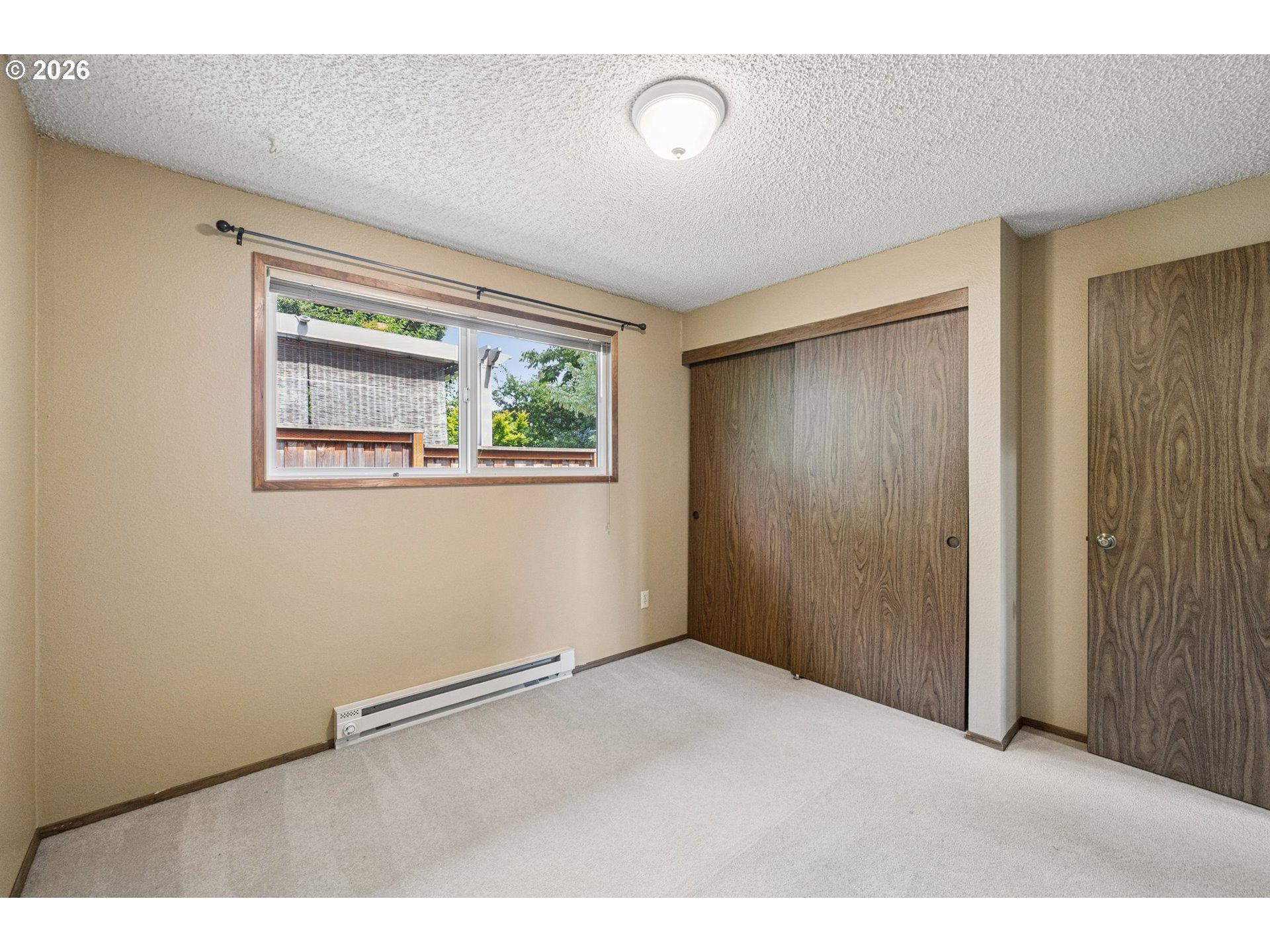255 West Berkeley Street Gladstone, OR 97027 - Photo 26 of 37 a view of an empty room with a window