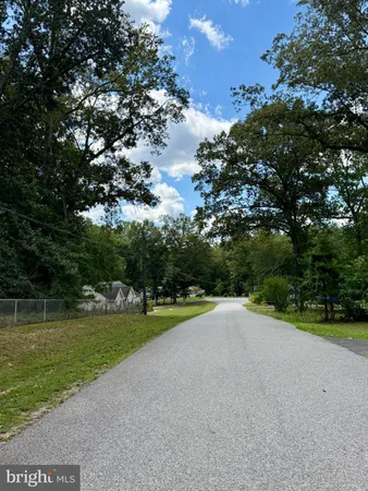 a view of a golf course with a lake