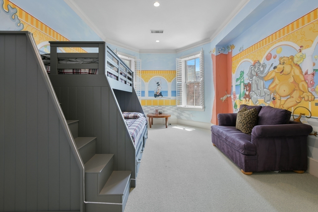 294 Commonwealth Avenue, Unit 2 Boston, MA 02115 - Photo 22 of 26 a living room with furniture and a flat screen tv