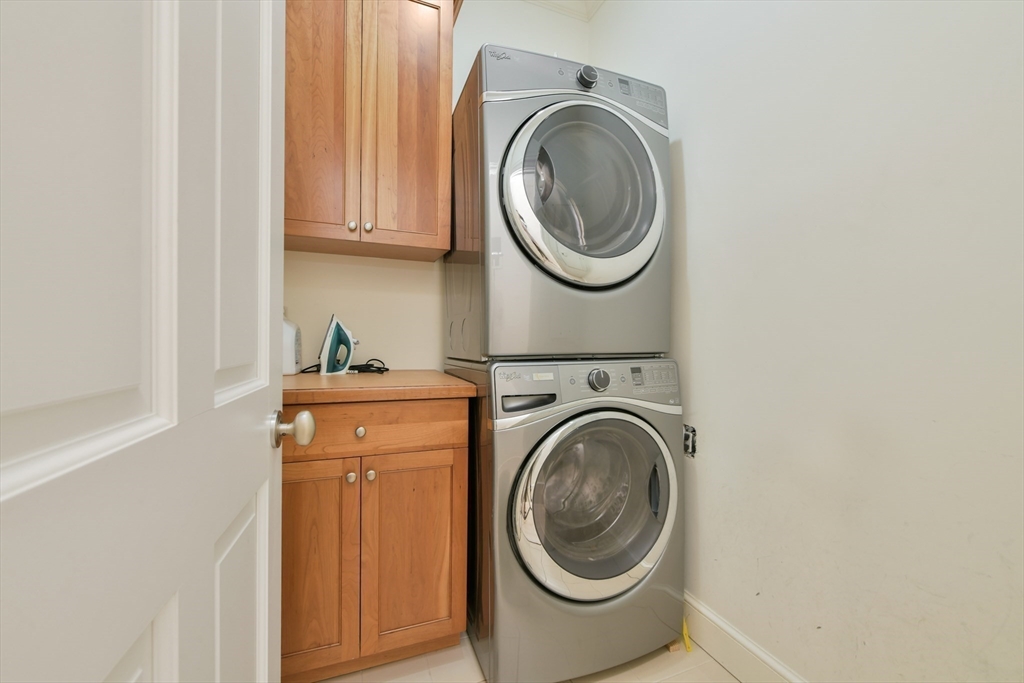 294 Commonwealth Avenue, Unit 2 Boston, MA 02115 - Photo 25 of 26 a utility room with dryer and washer