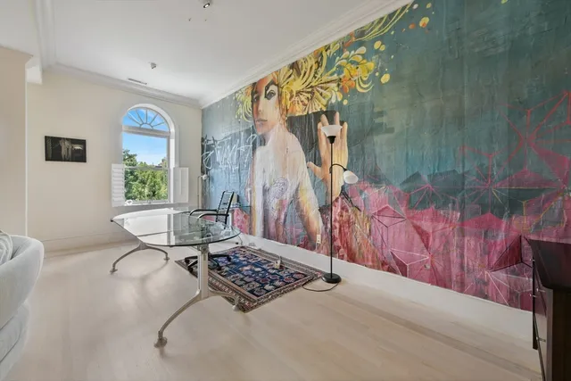 a living room with a couch and a table