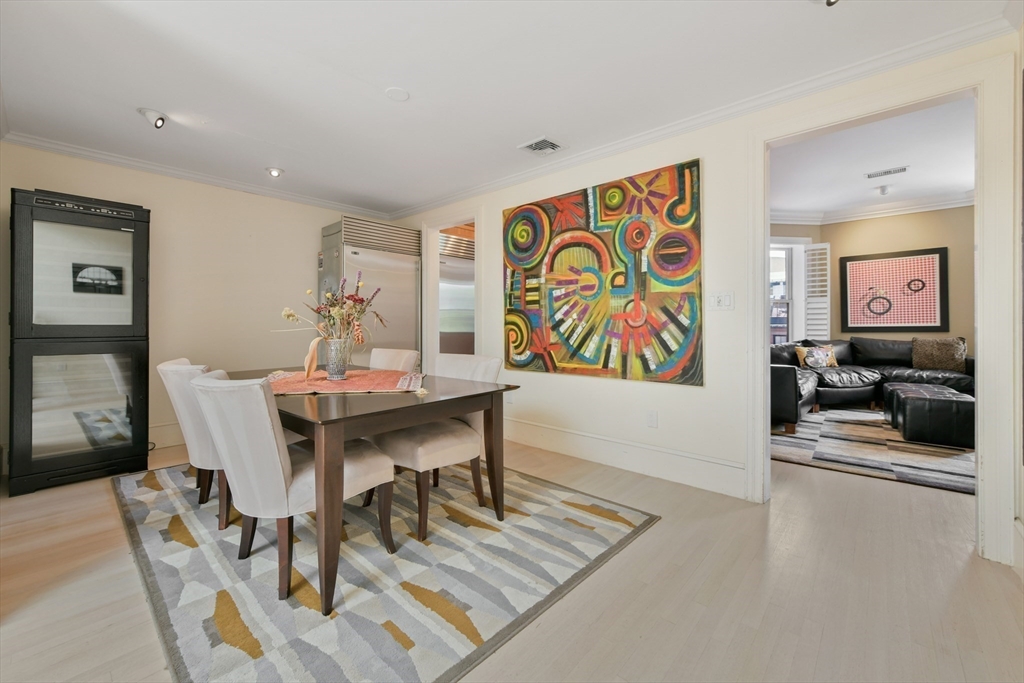 294 Commonwealth Avenue, Unit 2 Boston, MA 02115 - Photo 7 of 26 a view of a dining room with furniture