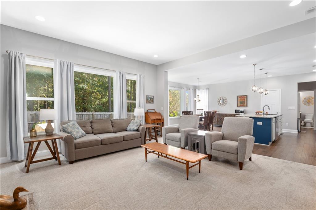 39 Floating Leaf Way Dallas, GA 30132 - Photo 11 of 40 a living room with furniture and a large window