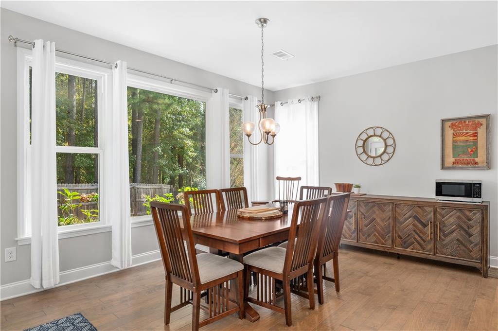 39 Floating Leaf Way Dallas, GA 30132 - Photo 17 of 40 a view of a dining room with furniture window and outside view