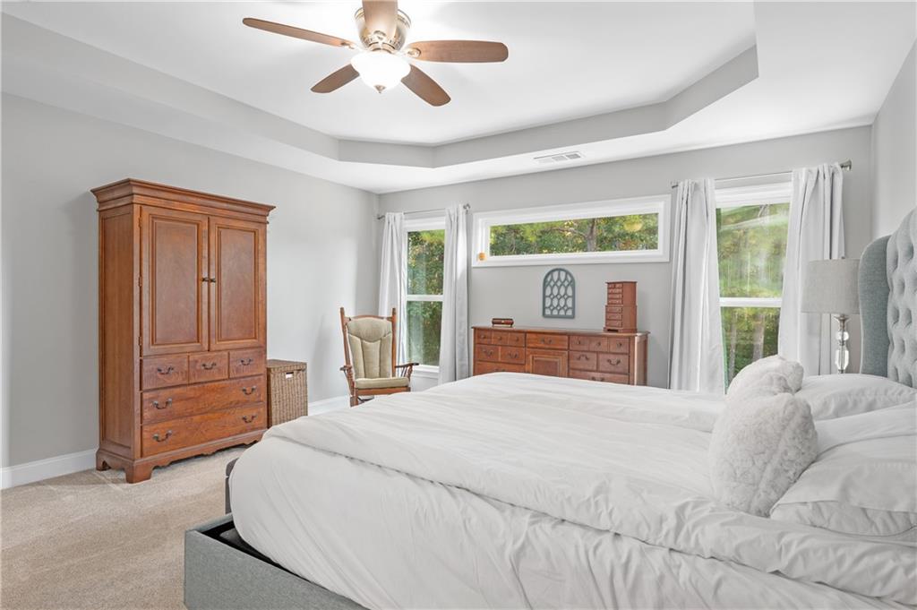 39 Floating Leaf Way Dallas, GA 30132 - Photo 22 of 40 a bedroom with a large bed and a window