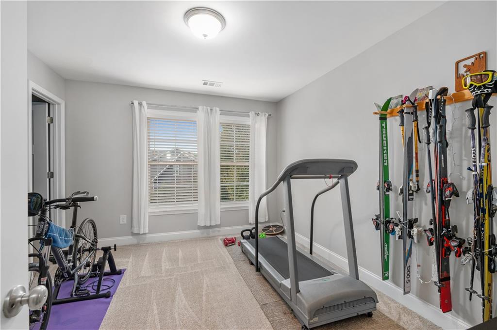 39 Floating Leaf Way Dallas, GA 30132 - Photo 26 of 40 a view of a room with gym equipment