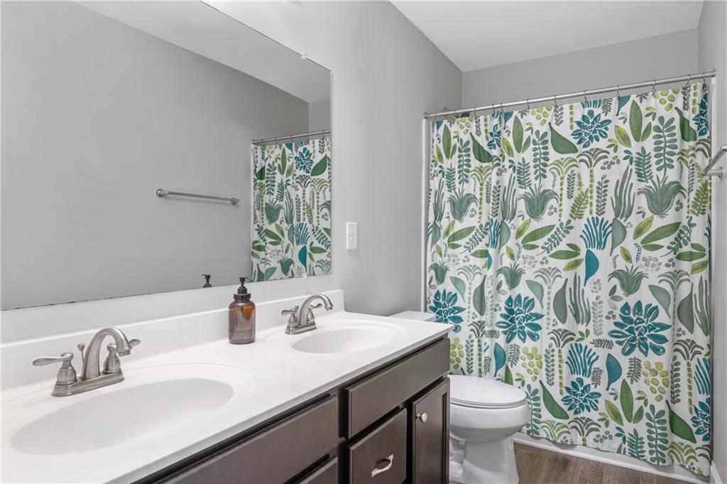 39 Floating Leaf Way Dallas, GA 30132 - Photo 27 of 40 a bathroom with a sink and a mirror